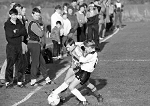 Images Dated 12th November 1988: Schoolboys playing football, Nunthorpe and Hemlington battle for possession in the Minor