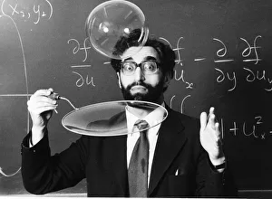 Science lecturer Cyril Isenberg blowing large bubbles March 1980 1980s Science lecturer Cyril Isenberg blowing large bubbles March 1980 1980s