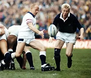 Scotland Rugby player John Jeffrey watches as England scrum half clers the ball from a