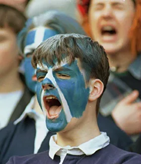 Scotland supporter shouts encouragement to rugby team during international against Scotland supporter shouts encouragement to rugby team during international against