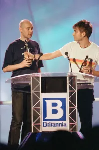 Scottish author of Trainspotting, Irvine Welsh, and Damon Albarn of Blur on stage at The Scottish author of Trainspotting, Irvine Welsh, and Damon Albarn of Blur on stage at The