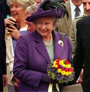 Scottish Parliament Opening Ceremony July 1999 Queen Elizabeth receives thistle posy Scottish Parliament Opening Ceremony July 1999 Queen Elizabeth receives thistle posy