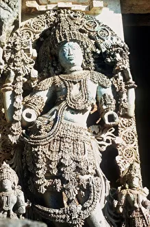 Sculpture and Carving on a Hindu Temple at Halebid Mysore state South India Sculpture and Carving on a Hindu Temple at Halebid Mysore state South India
