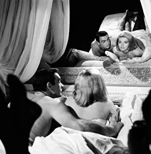 Sean Connery as James Bond with actress Daniela Bianchi as Tatiana Romanova in scene Sean Connery as James Bond with actress Daniela Bianchi as Tatiana Romanova in scene