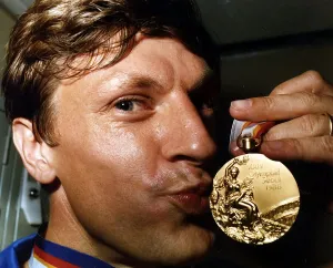 Sean Kerly kisses his 1988 Olympic gold medal at Heathrow Sean Kerly kisses his 1988 Olympic gold medal at Heathrow