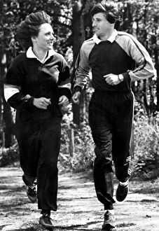 Images Dated 5th May 1982: Sebastian Coe and friend running along forest trail during training - May 1982