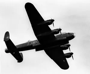 Images Dated 23rd August 1981: A Second World War Avro Lancaster bomber flies past at Teesside Airport. August 1981