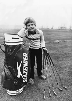 Images Dated 29th November 1978: Seven year old Charles Casson stands with his specially made scaled down clubs made for