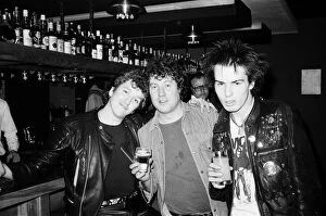 Images Dated 11th December 1977: The Sex Pistols in Eindhoven, Holland. Steve Jones and Sid Vicious with a local