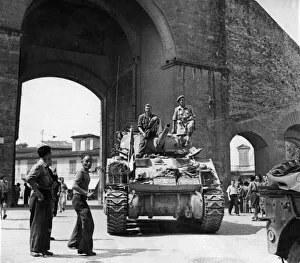A Sherman tank of a South African unit of the Eighth Army enters the city of Florence A Sherman tank of a South African unit of the Eighth Army enters the city of Florence