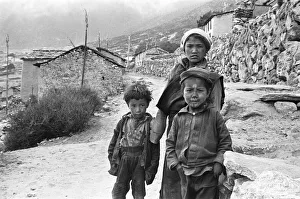 Sherpa children pose in the street of one of the high villages in the SoluKhumbu region Sherpa children pose in the street of one of the high villages in the SoluKhumbu region