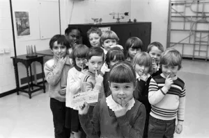 Shhh... says five-year-old Emily Fozzard as she hands over this £ Shhh... says five-year-old Emily Fozzard as she hands over this £