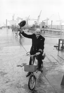 Images Dated 22nd January 1970: Ships Captain Tom Agnew Captain Agnew with his bike on the deck of the massive Esso
