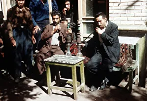 Shiraz South West Iran Persians smoking hubble bubble pipes at a cafe Shiraz South West Iran Persians smoking hubble bubble pipes at a cafe