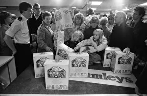 Images Dated 3rd December 1983: Shoppers buying Cabbage Patch Dolls at Hamleys, London toy store. 3rd December 1983