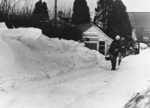 Shoppers head home after buying essential supplies and groceries are pictured leaving Shoppers head home after buying essential supplies and groceries are pictured leaving