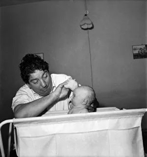 Sid Field with baby. September 1948 O14844-002 Sid Field with baby. September 1948 O14844-002
