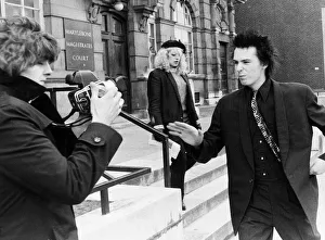Sid Vicious Six Pistols goes to assault photographer 1978 outside court Sid Vicious Six Pistols goes to assault photographer 1978 outside court