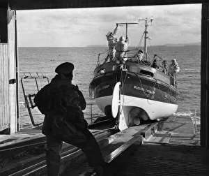 Lifeboat Gallery: Silhouetted against the waters of Moelfre Bay, Anglesey, Wales