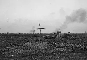 A simple cross marks the spot of a grave of a Belgian soldier killed during the fighting A simple cross marks the spot of a grave of a Belgian soldier killed during the fighting