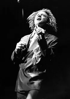 Images Dated 15th March 1989: Simply Red singer Mick Hucknell in concert at the NEC Arena, Birmingham