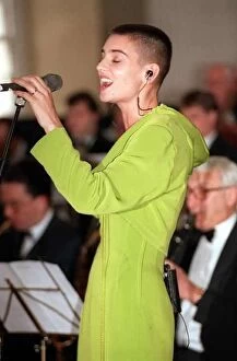 Images Dated 11th April 1990: Sinead O Connor Irish singer 1990 singing with orchestra
