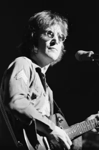 Images Dated 30th August 1972: Former singer of The Beatles pop group John Lennon pictured performing on stage during