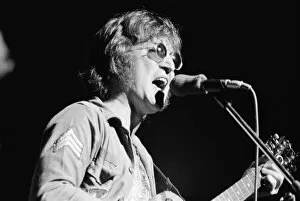 Images Dated 30th August 1972: Former singer of The Beatles pop group John Lennon pictured performing on stage during