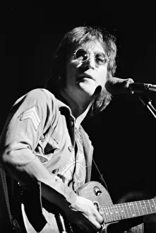 Images Dated 30th August 1972: Former singer of The Beatles pop group John Lennon pictured performing on stage during