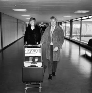 Singer Cilla Black pictured at Heathrow airport with her husband Bobby Singer Cilla Black pictured at Heathrow airport with her husband Bobby