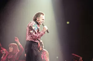 Images Dated 7th July 1992: Singer Neil Diamond, pictured in concert at the Birmingham NEC. 11th July 1992