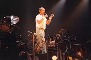 Images Dated 9th November 1997: Singer Phil Collins performs in concert at Newcastle Arena 9 November 1997