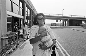 Images Dated 4th August 1975: Singer Roy Orbison, pictured at Manchester Ringway Airport in 1975