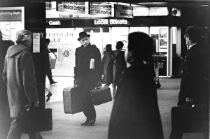 Sir Alec Douglas Home looking vague at railway station carrying luggage - February 1979 Sir Alec Douglas Home looking vague at railway station carrying luggage - February 1979