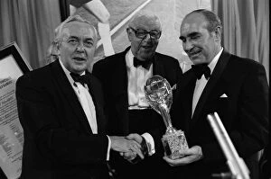 Images Dated 30th July 1974: Sir Alf Ramsey holds World Cup at Cafe Royal July 1974
