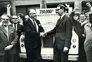 Sir George Farmer congratulating production manager Mr James Lawrence as the 750