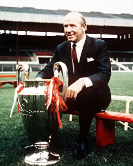 Manchester Collection: Sir Matt Busby manager of Manchester United poses at a pres season photocall with