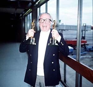 Sir Richard Attenborough Actor/Director at Heathrow airport with the Oscars he won for