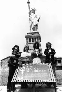 Images Dated 1st July 1975: Slade pop group visit The Statue of Liberty 1975 Dave Hill Noddy Holder Don Powell