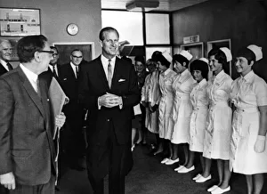 A smiling Prince Philip and smiling nurses as he leaves the Dental Hospital A smiling Prince Philip and smiling nurses as he leaves the Dental Hospital