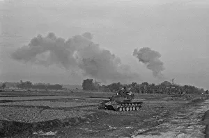 Smoke rising in the distance as armoured units of the South Vietnamese army shell Viet Smoke rising in the distance as armoured units of the South Vietnamese army shell Viet