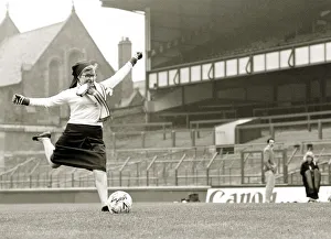 Images Dated 30th October 1985: Soccer Sister - Nun kicking football shooting at goal Goodison Park Everton