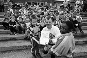 Images Dated 7th April 1989: Soccer smiles from Gregory Wadsworth (front left) and Damien Wright as they receive their
