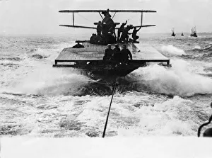 A Sopwith Camel fighter biplane being transported out to sea by means of H6 lighter A Sopwith Camel fighter biplane being transported out to sea by means of H6 lighter