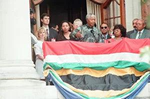 Images Dated 7th February 2011: South African President Nelson Mandela addresses the crowds from the balcony of South
