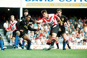 00492 Gallery: Southampton footballer Matthew Le Tissier on the ball faced by Paul Ince during their