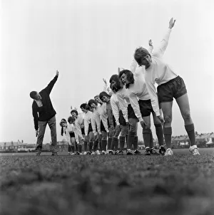 Southampton Ladies Football Club limber up with their manager Mr Norman Holloway Southampton Ladies Football Club limber up with their manager Mr Norman Holloway