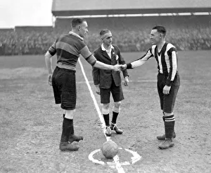Southport v. Bradford. February 1931. McConnell of Southport shakes hands with Elwood of Southport v. Bradford. February 1931. McConnell of Southport shakes hands with Elwood of