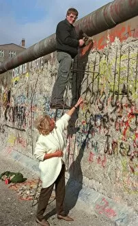 Souvenir pieces of the Berlin wall are being removed-pictured, Germany February 1990