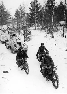 Soviet motor cyclists and armoured cars advancing during the Second World War Soviet motor cyclists and armoured cars advancing during the Second World War